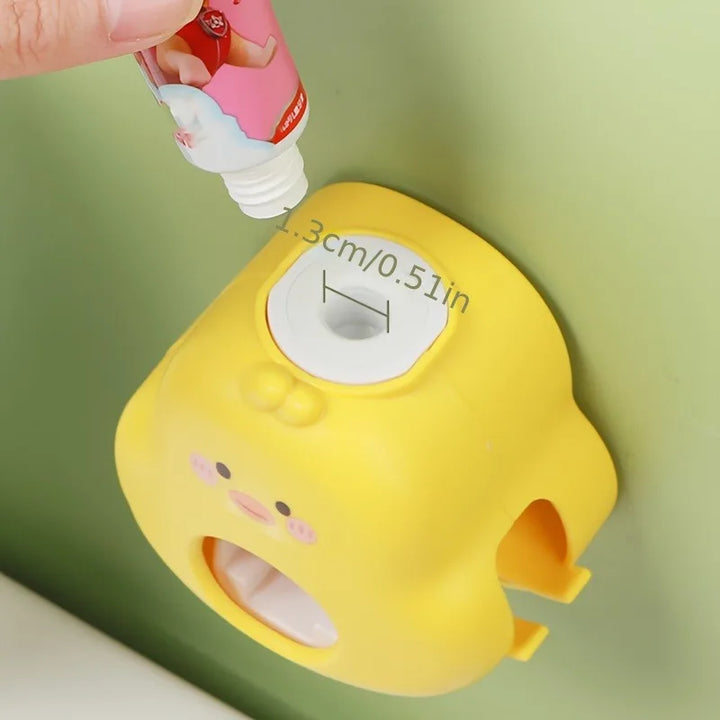 Dispensador de creme dental infantil